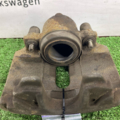 Суппорт передній правий Skoda Octavia II 1K0615124E