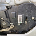 Замок задньої лівої розпашонки дверки Volkswagen Caddy III (2004-2015) 2K0827201AB