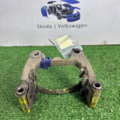 Скоба суппорта тормозного зад. прав. Volkswagen Passat B6 3AA615426B